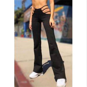 Women’s Punk Style Cut Out Flare Low Waist Solid Color Stretch Bell Bottom Stretch Pants Gothtopia https://gothtopia.com